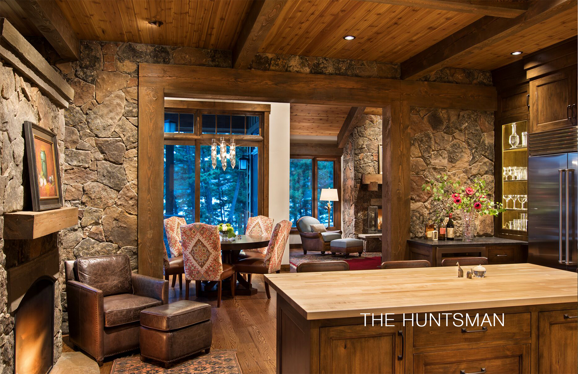 Four-sided custom stone fireplace in Madison Valley residence