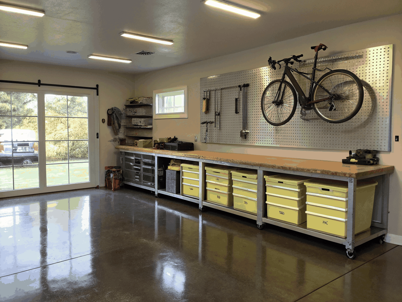 Custom timber frame gear depot and carriage house with heated polished concrete floors